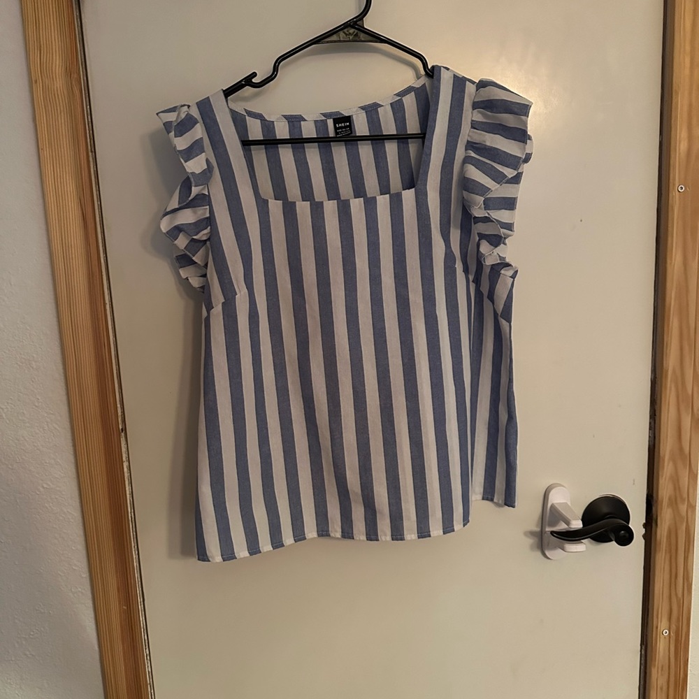 White and blue blouse